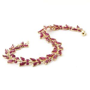 14K. SOLID GOLD BUTTERFLY BRACELET WITH  RUBIES